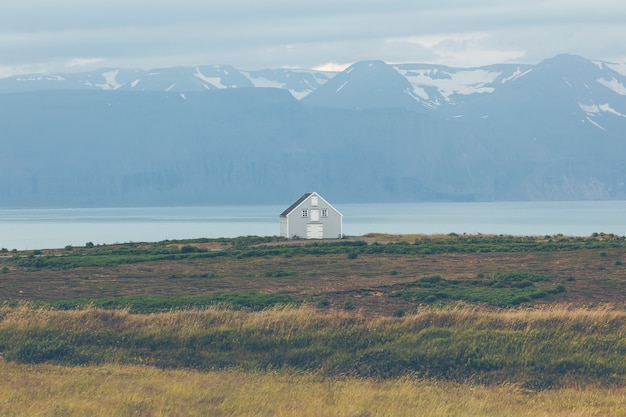 Siding house at coastline in East Iceland