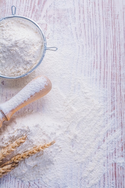 Sieve with rolling pin and ears