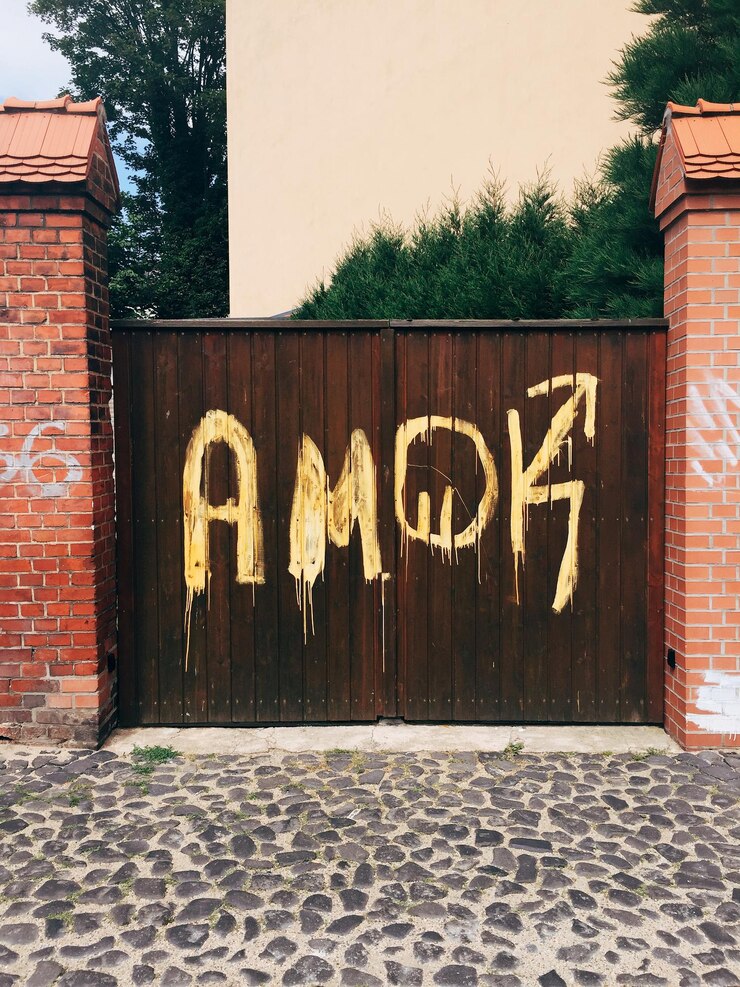 Photo sign on brick wall