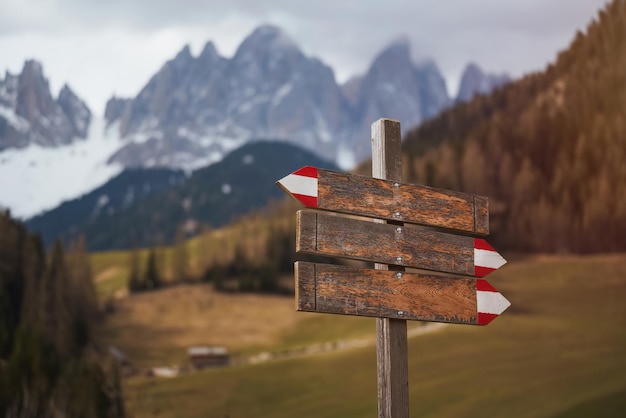 Sign for hiking trails in the Dolomites Signpost on a hiking trail in the Alps