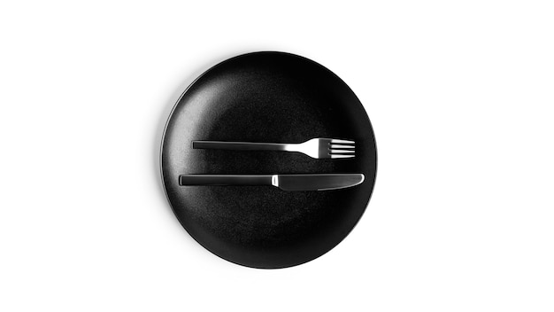 Sign language with cutlery. A plate with cutlery isolated on a white background. Plate, knife, fork on a white background. High quality photo