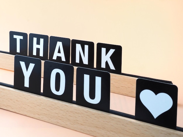 Photo sign with thank you message and heart