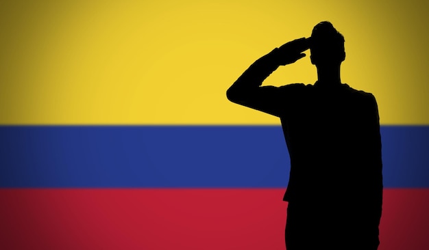 Silhouet van een soldaat die salueert tegen de vlag van colombia