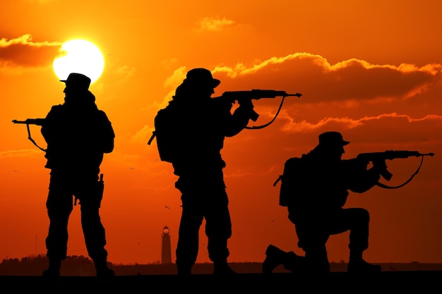 Silhouet van het team van soldaten met zonsopgang