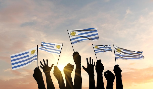 Silhouet van opgeheven armen zwaaien met een vlag van uruguay met trots d rendering