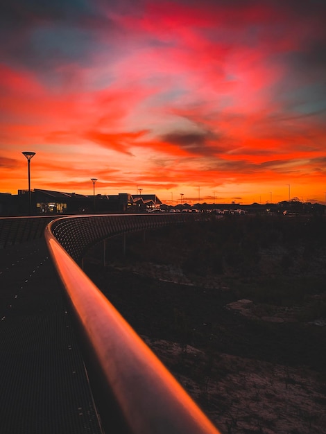 Photo silhouette bridge against sky during sunset