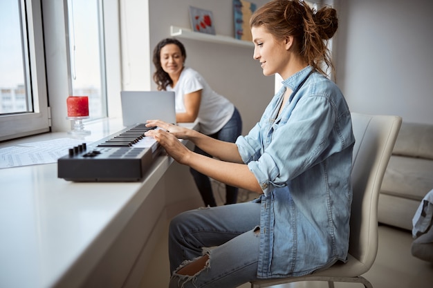 Silhouette of brunette that expressing positivity while working on the distance