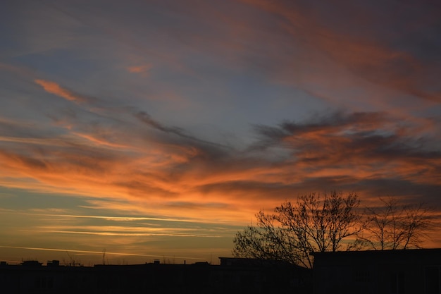 silhouette of building against sky during sunset
