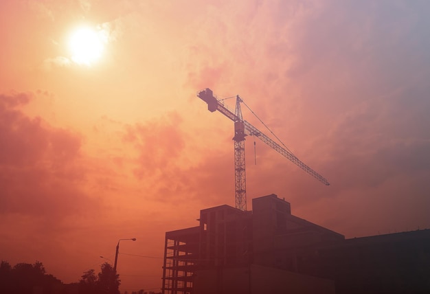 Silhouette of building crane background