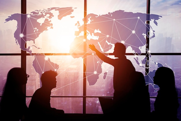 Silhouette of business people meeting in the office