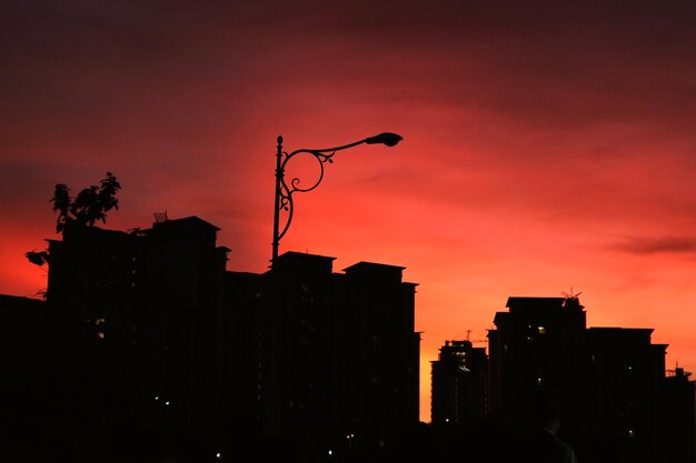 Silhouette of city at sunset