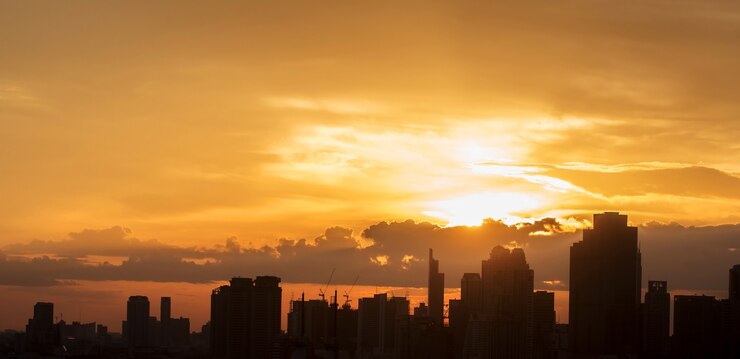 Silhouette of the city with the sky on sunset , Bangkok , Thailand