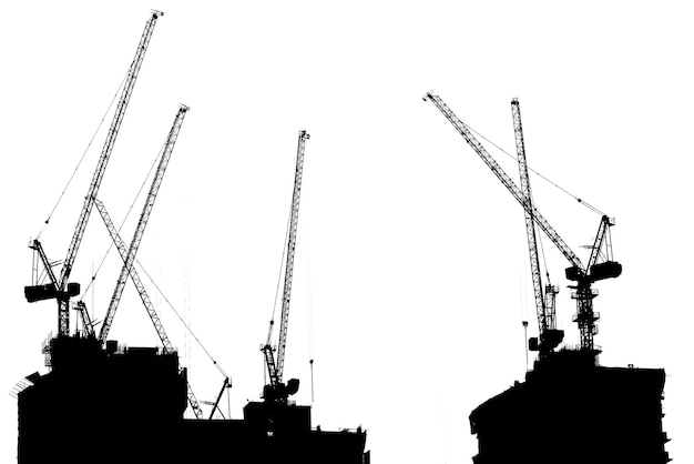 Photo silhouette cranes against clear sky