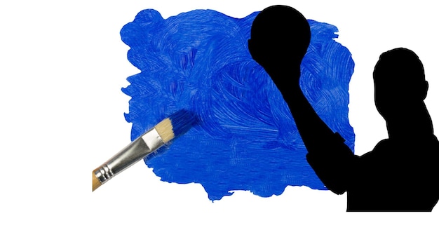 Silhouette of female handball player against blue paint stain and paint brush on white background