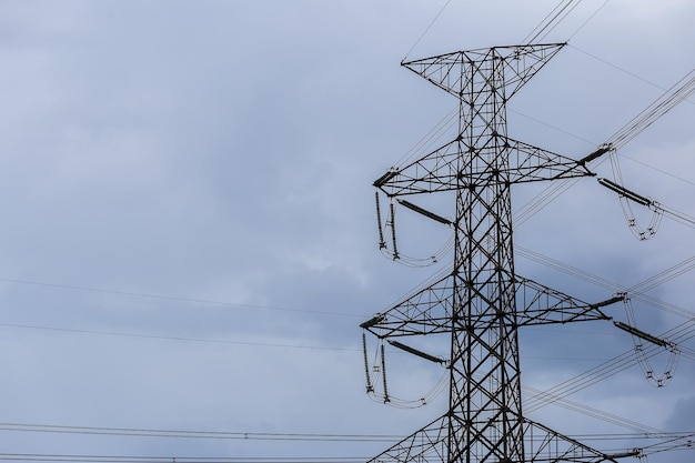 Silhouette of high voltage electrical pole structure