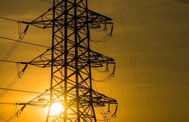 Silhouette of high voltage electrical pole structure