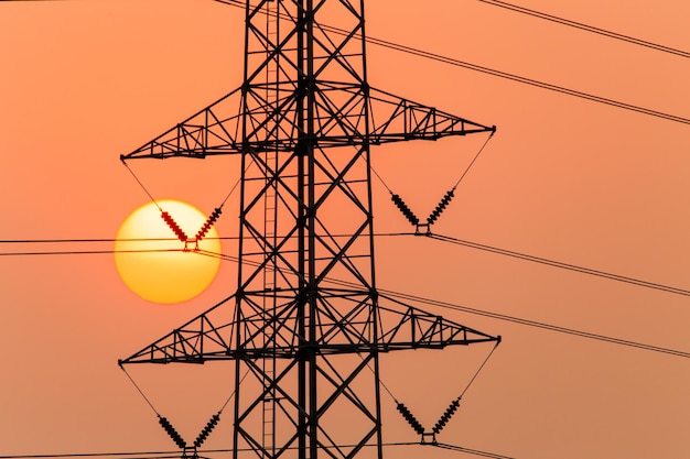 Silhouette of high voltage electrical pole structure