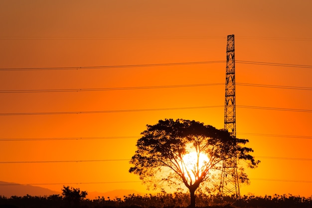 Silhouette of high voltage electrical pole structure