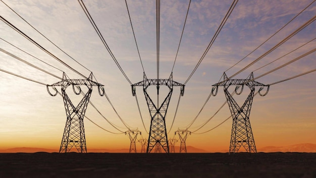 The silhouette of the high voltage power lines during sunset