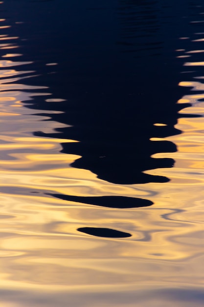 Silhouette of the hill two brothers mirrored in the lagoon rodrigo de freitas