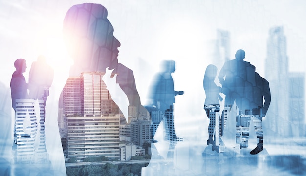 Silhouette image of business people group on city background