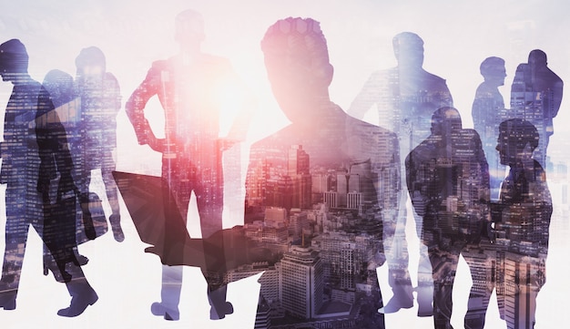 Silhouette image of business people group on city background