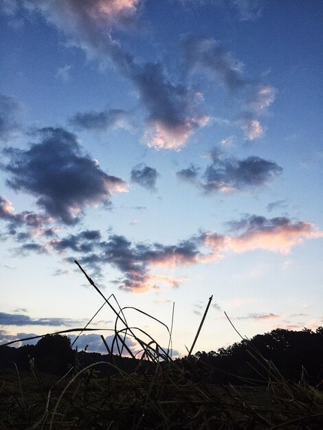 Silhouette landscape against sky during sunset