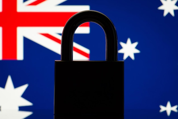 Silhouette of lock on the background of flag of Australia