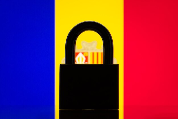 Silhouette of lock in front of flag of Andorra