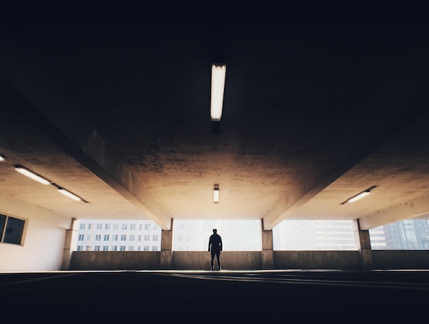 silhouette man in building
