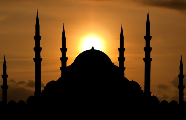 Silhouette of mosque when sun goes down