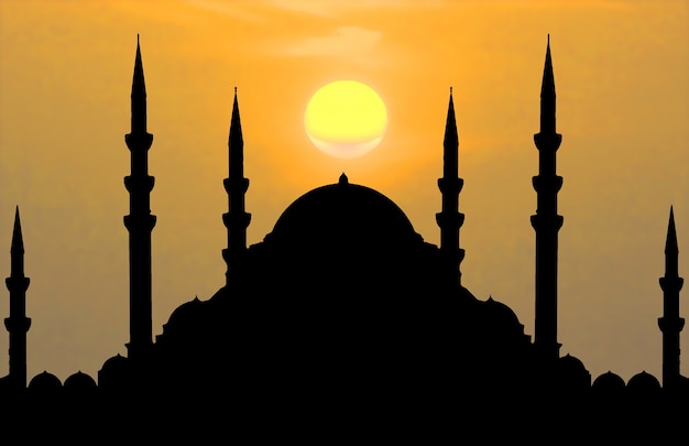 silhouette of mosque when sun goes down