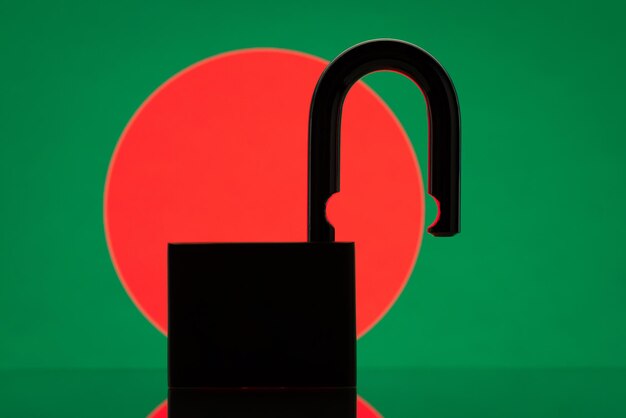 Silhouette of open lock against flag of Bangladesh