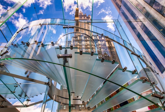 Silhouette people on glass staircase, view from the bottom.Business concept.