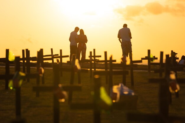 Silhouette people at sunset