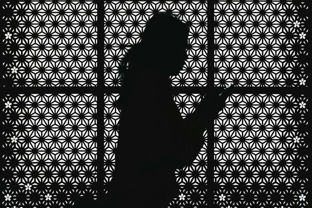 Photo silhouette of person standing by shadow