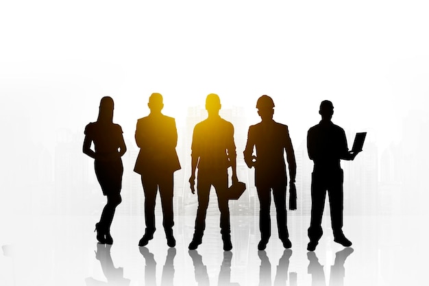 Photo silhouette of professional workers on background