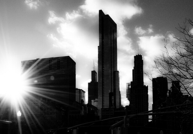 Premium Photo | Silhouette of skyscrapers at sunny day