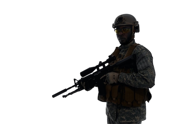 Silhouette of soldier wearing body armour and helmet