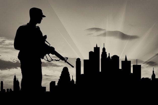 Photo silhouette of soldier with a gun