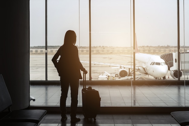 silhouette of traveler at the airport