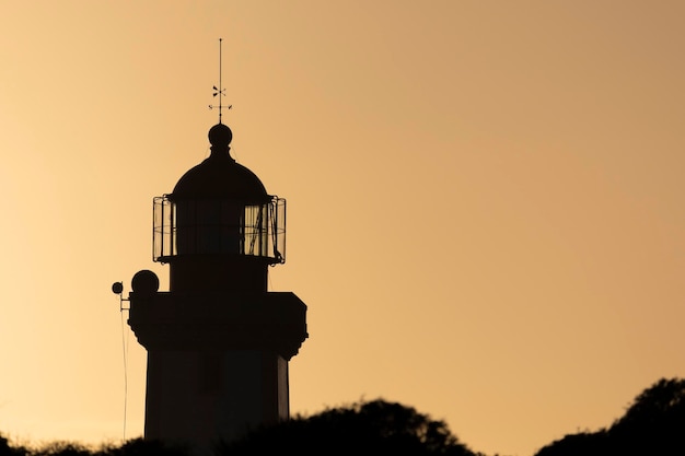 Silhouette view of the Alfanzina Lighthouse