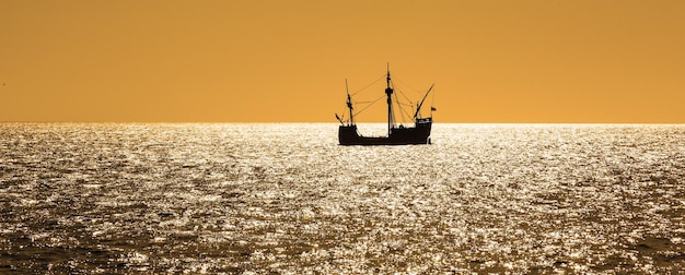 Silhouette view of the Santa Maria tallship of Columbus