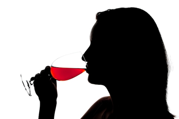 Silhouette di donna degustazione di vino