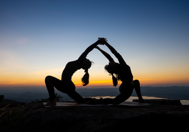 Silhouette Yoga on the Mountain