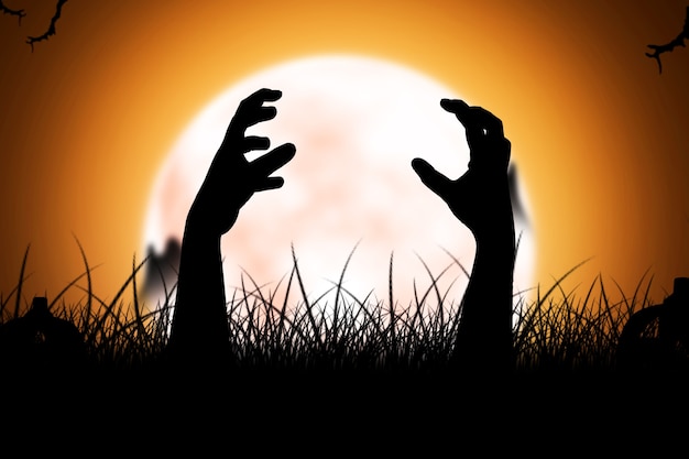 Silhouette of zombie hand raised from the ground with full moon background