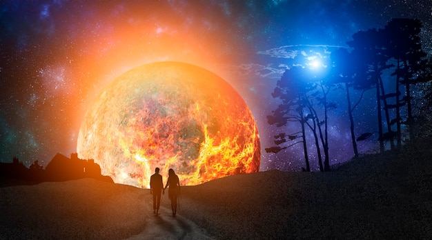 Silhouetten van geliefden tegen de achtergrond van de sterrenhemel en de planeet