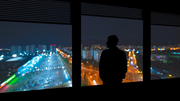 Silhouettes of people on a panorama background