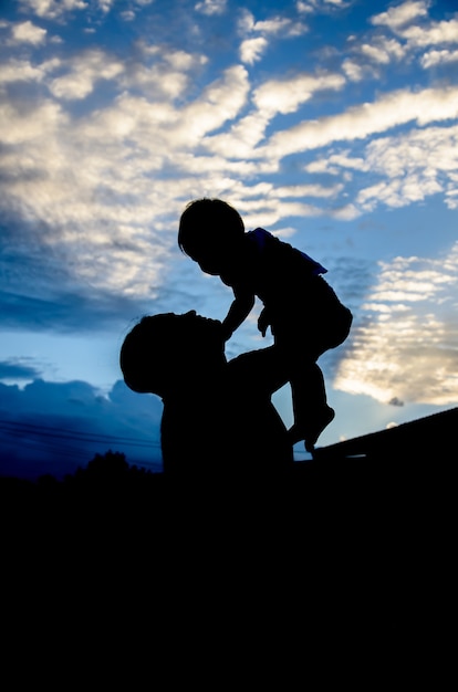 Silhouettes of the Thai women and child