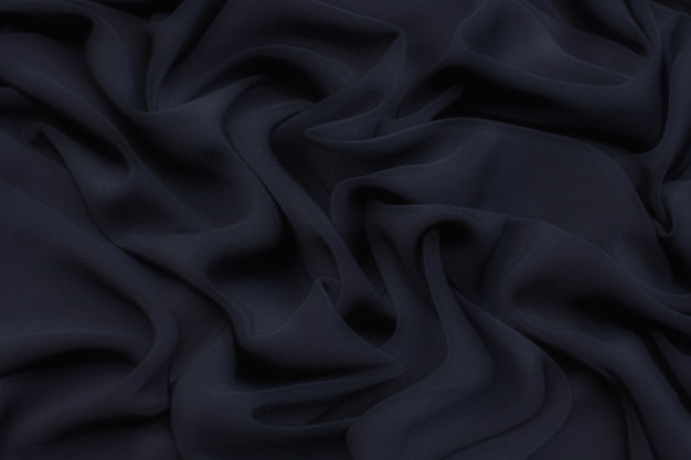 Silk fabric, cadi, black color in artistic layout